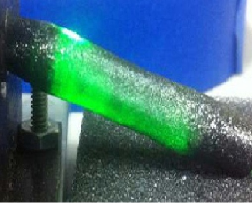 Synthetic diamond tube illuminated with green laser